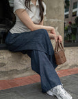 Wide-Leg Pleated Denim Pants