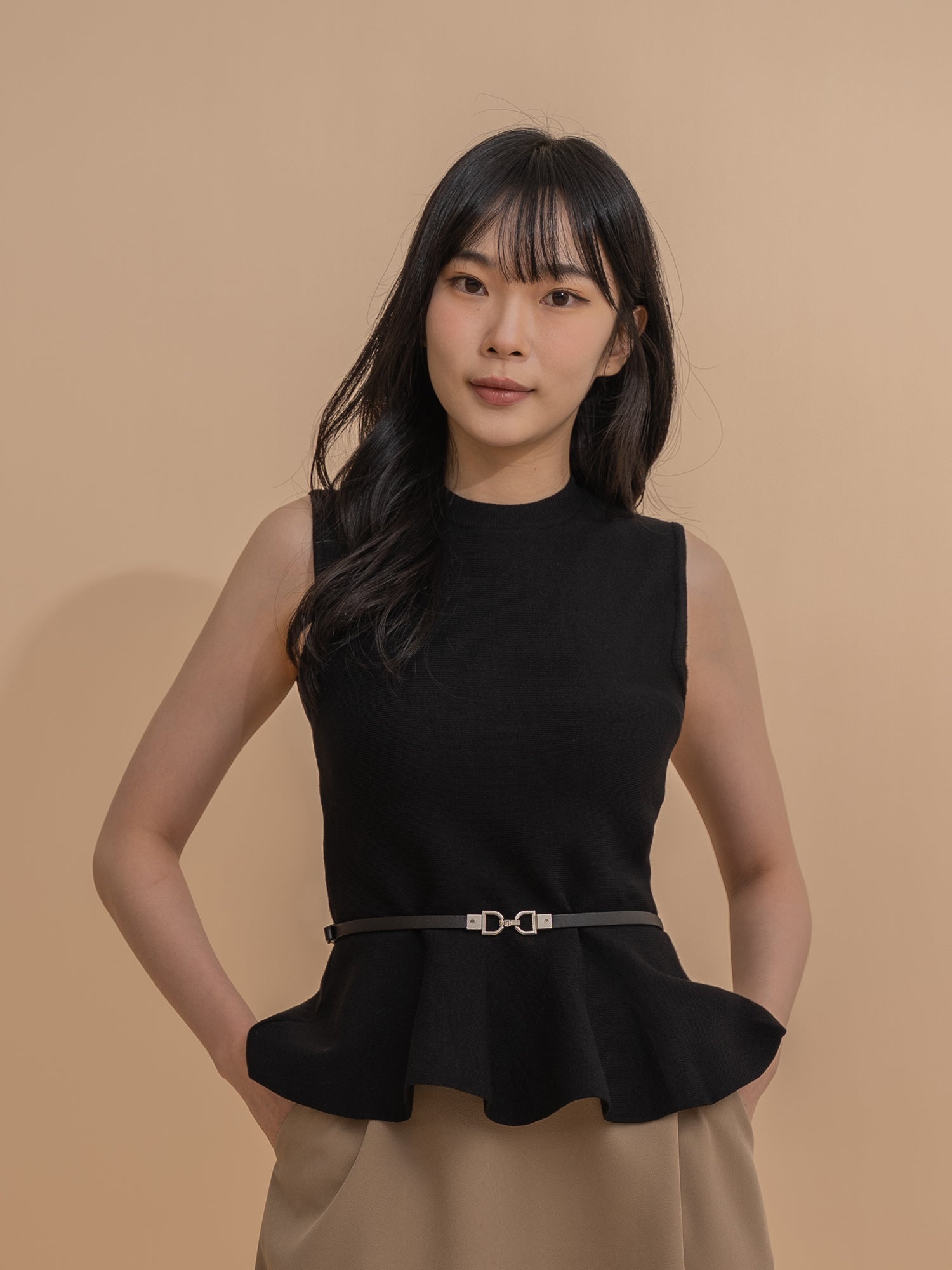 Sleeveless Peplum Knit Top