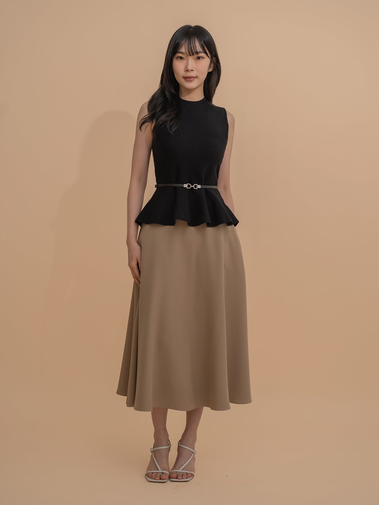 Sleeveless Peplum Knit Top