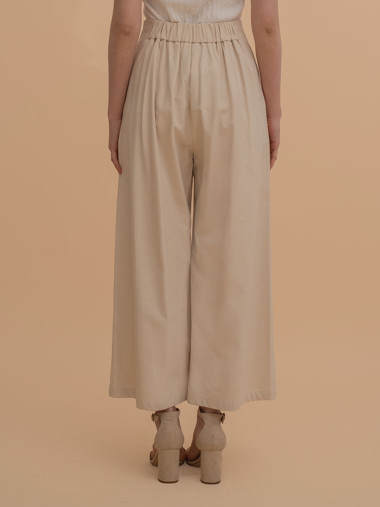 Wide-Leg Pleated Trousers