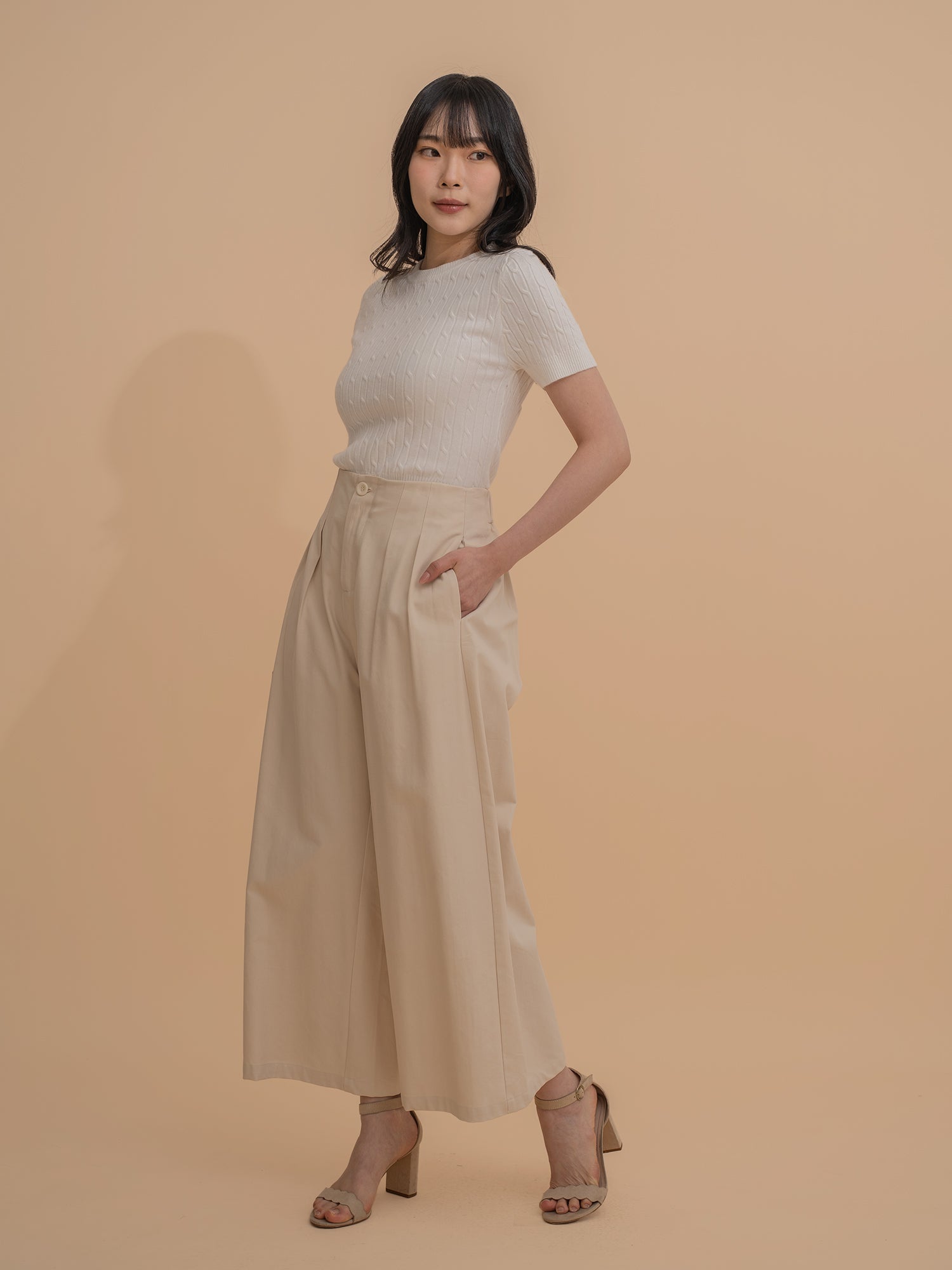 Wide-Leg Pleated Trousers
