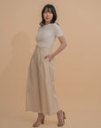 Wide-Leg Pleated Trousers