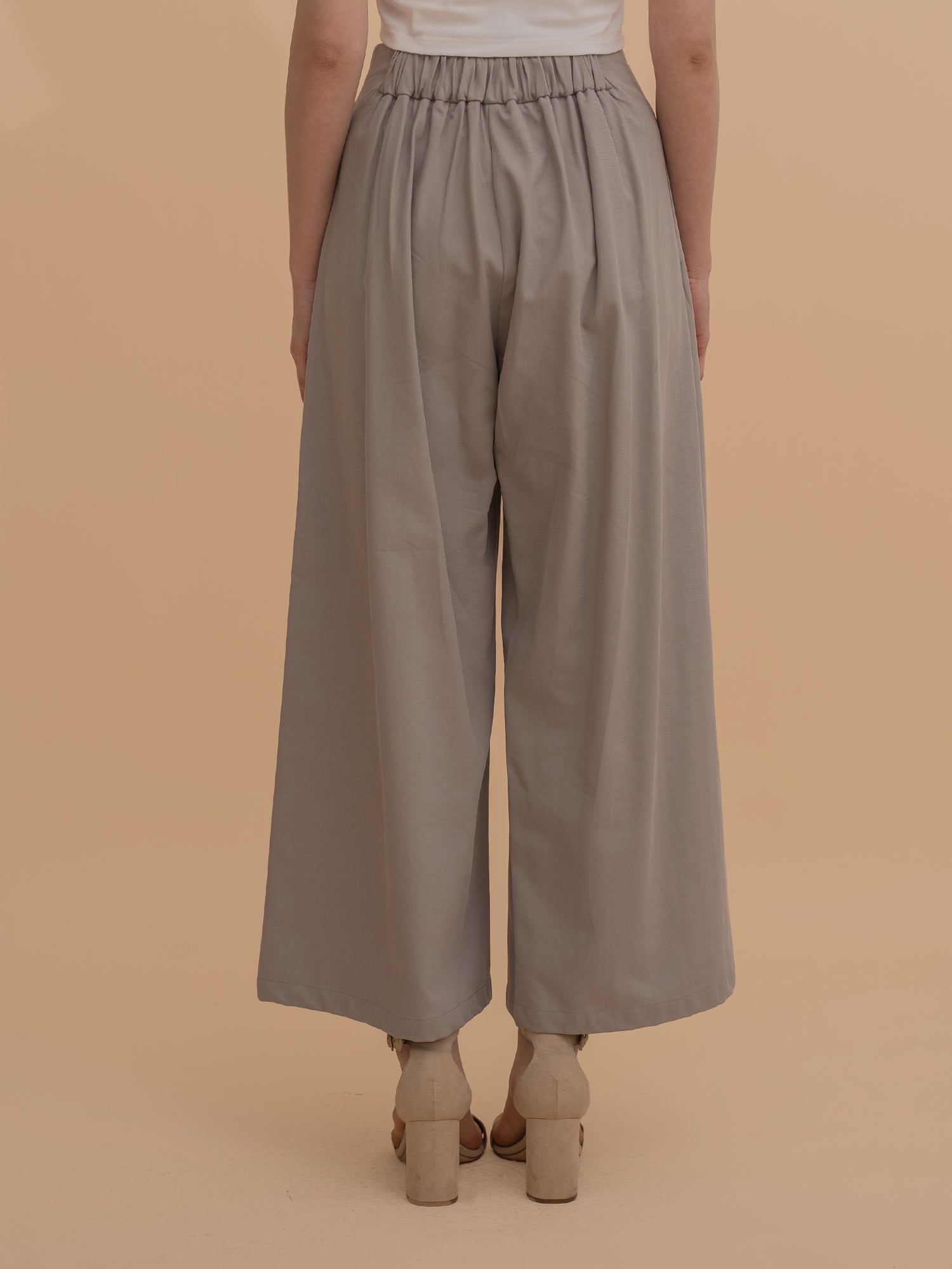 Wide-Leg Pleated Trousers
