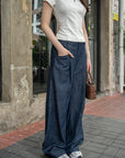 Wide-Leg Pleated Denim Pants